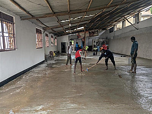 Mopping the New Cement Floor: New Life at COBAP Gym